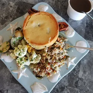 Vegan wellington, wild rice, cauliflower fricassee, with brown vegetable sauce