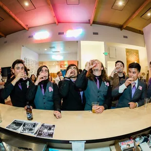 a group of people taking a selfie