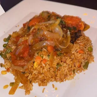 a plate of rice and vegetables