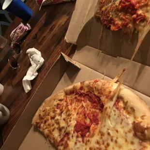 a slice of pizza in a box