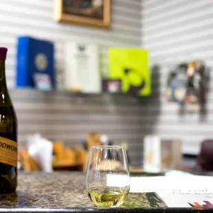 wine bottles and a glass