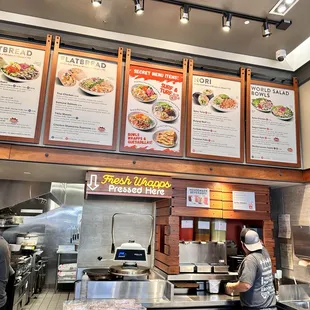 a man preparing food in a restaurant