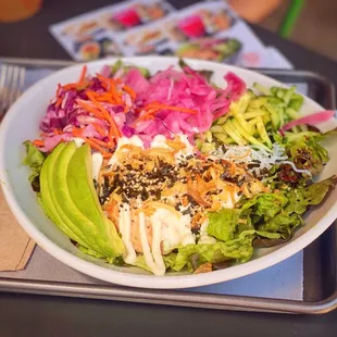 a bowl of food on a tray