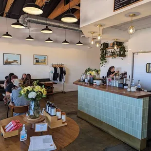 people sitting at a table in a coffee shop