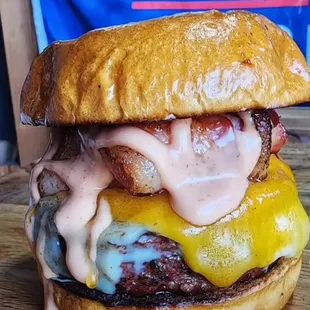 a cheeseburger with bacon and cheese