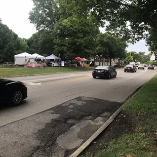 cars driving down the street
