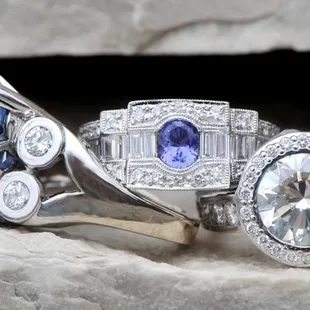 A trio of one-of-a-kind diamond and sapphire rings, designed and handcrafted by Worthington Jewelers.