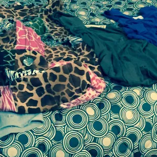 Patchwork bag, necklace, shirts, pants, and shorts ...