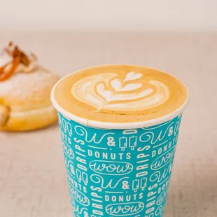  a cup of coffee and a donut