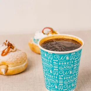  a cup of coffee and donuts