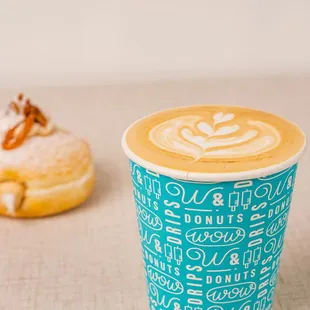 a cup of coffee and a donut