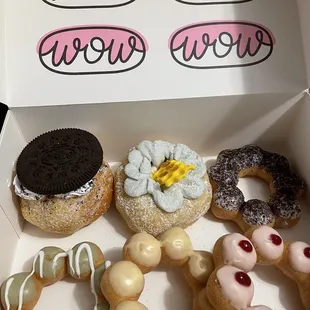 Assorted donuts. Some mochi and the others were Oreo and Lavender Honey.