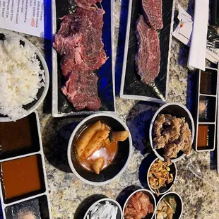 First round of meats with Wow premium and Wow signature steak with Korean crispy chicken and tteokbokki with sides