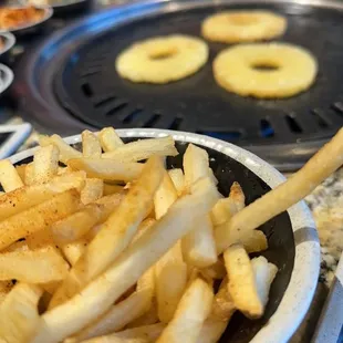 Fries for the little one :) and cinnamon pineapple