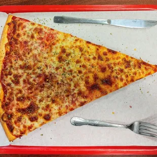 Cheese Jumbo Slice: that&apos;s a cafeteria tray and a knife and fork for scale