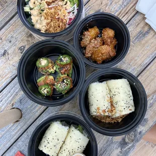 Poke bowl, wings, spicy daiko, crab sushi burrito &amp; tuna sushi burrito