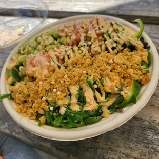 Build your own poke bowl. Seaweed, salmon, spicy tuna, spicy mayo, and house sauce.