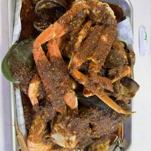 Combo C with Cajun Sauce, Medium 1/2 lb shrimp  1/2 lb clams 1/2 lb mussels 1/2 lb snow crab 2 corn 2 sausage 2 potatoes
