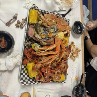 Snow crab, Crawfish, Muscles, sausage, and corn in garlic butter sauce!