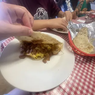 Chorizo, egg, beans and potatoes taco.