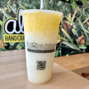 Mango colada - Pressed Coconut and Pineapple Lemonade with Mango float