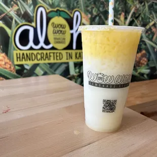 Mango colada - Pressed Coconut and Pineapple Lemonade with Mango float