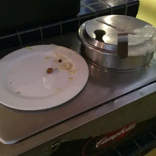 More filth.... No one takes the time to clean anything here. This was how the soup station looked.