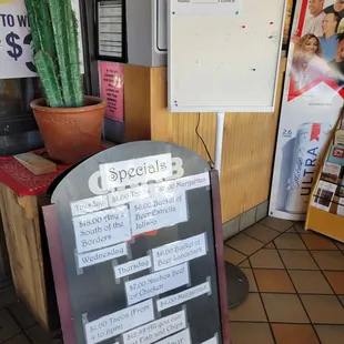 Hours and specials board