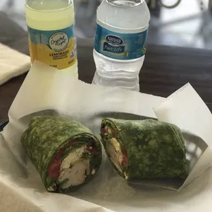 a bottle of water and a sandwich