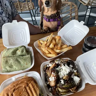 Nashville hot chicken sandwich, shrimp PO boy, Parmesan truffle fries and Brussels sprouts