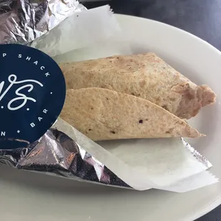 Outside of a The Scott Louis Wrap