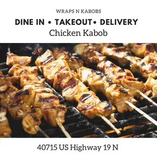 chicken skewers on a grill