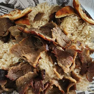 Supposedly Gyro with rice. But is rice with a little gyro meat.