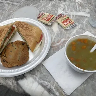 a plate of food and a cup of soup