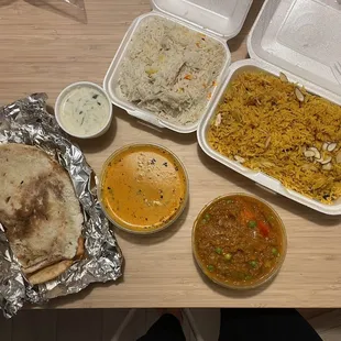 Regular naan, free yogurt sauce, Chicken Tikka Masala, Baingan Bharta vegan (eggplant), Basmati rice, and Chicken Briyani.
