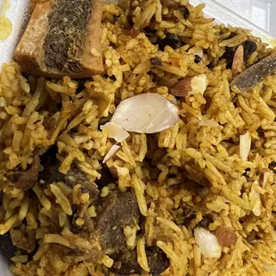 Flavorless dry goat biryani (not fresh)