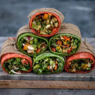 a stack of vegetables wrapped in burlock