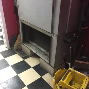 Broken down filthy air conditioner with no filters.