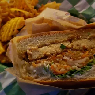 Tofu katsu sandwich ($11), vegan by default. Really tasty. Great bun. Sauce is a little drippy, but it&apos;s a lovely creation.