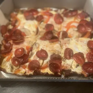 Supreme pizza without green olives