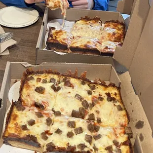 Two tasty Wrectangle pizzas, one with just cheese, the other with sausage. The rectangular-cut sausage bits were a nice touch.