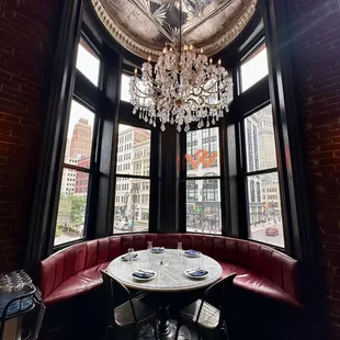 Corner booth with chandelier.