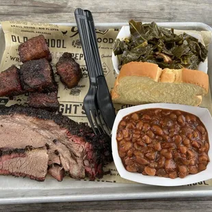 Bbq two meat plate with brisket and burnt ends, collard greens, and smoked beans