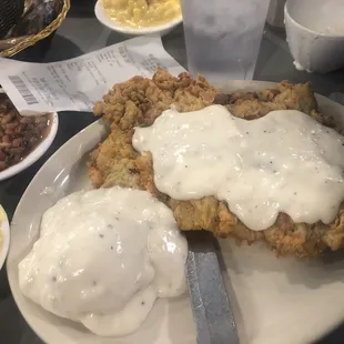 Chicken fried steak, black eyed peas, Mac and cheese, mashed potatoes