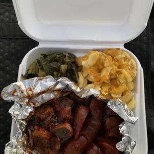 a meal in a styrofoam container