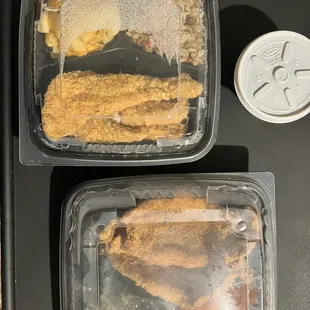 Red Snapper dinner and Catfish dinner with side of Collard Greens (in white cup)