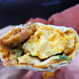 The fillings inside the breakfast burrito are scanty but well seasoned. Sadly, not a home fry in sight.