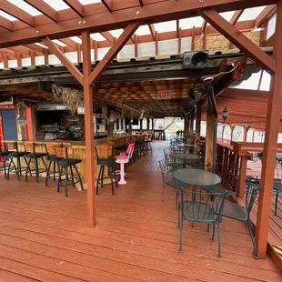 The outside wrap-around deck has its own bar.
