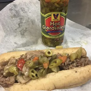 a hot dog with pickles