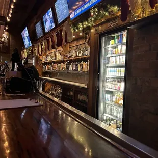 a bar with a television in the background